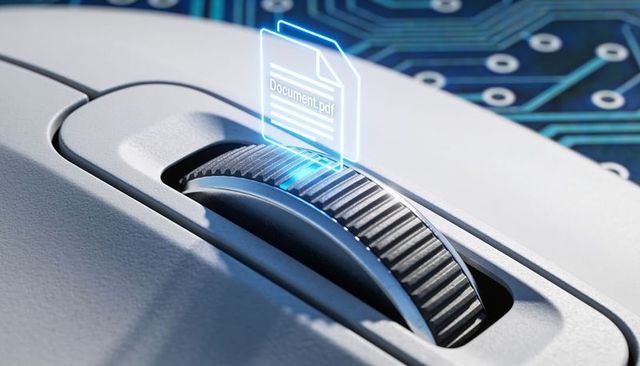 Holographic pdf hovering over mouse scroll wheel on circuit board for digital workflow concept