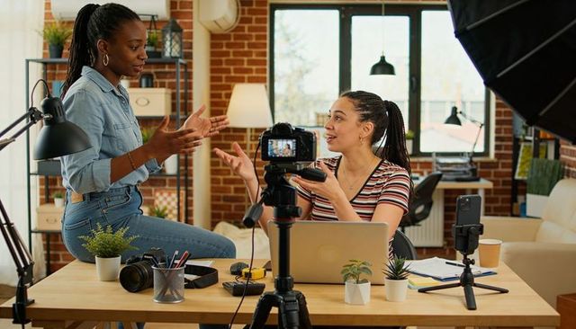 Female Creators Filming DSLR Content in Loft Home Office with Softbox Lighting