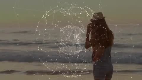 Woman on Beach Interacting with Futuristic Digital Network
