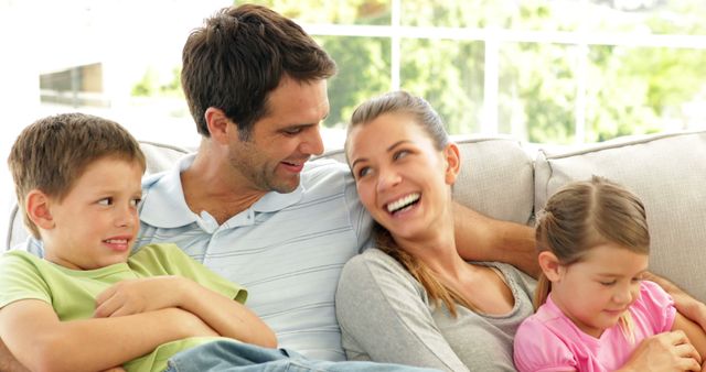 Happy Family Bonding on Sofa in Living Room - Download Free Stock Images Pikwizard.com