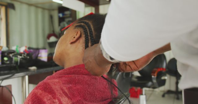 Hair Stylist Doing Cornrow Braids in Hair Salon - Download Free Stock Images Pikwizard.com