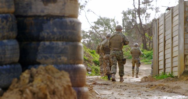 Military Soldiers on Training Mission in Outdoor Terrain - Download Free Stock Images Pikwizard.com