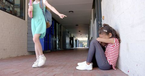 School Conflict: Girl Experiencing Bullying in Hallway - Download Free Stock Images Pikwizard.com