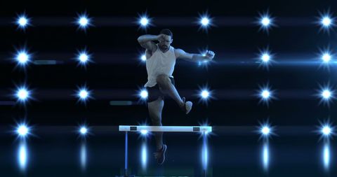 Athletic Hurdler Practicing with Dazzling Light Effects