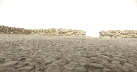transparent road view with low stone walls - Download Free Stock Videos Pikwizard.com