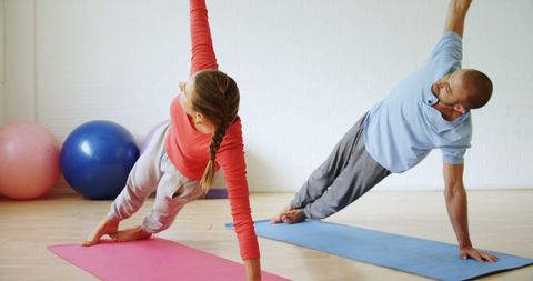 Couple Practicing Yoga Together in Bright Studio - Download Free Stock Images Pikwizard.com