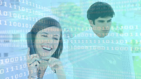 Smiling Businesswoman and Colleague with Digital Binary Overlay