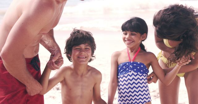 Happy Family Enjoying Beach Day with Kids - Download Free Stock Images Pikwizard.com