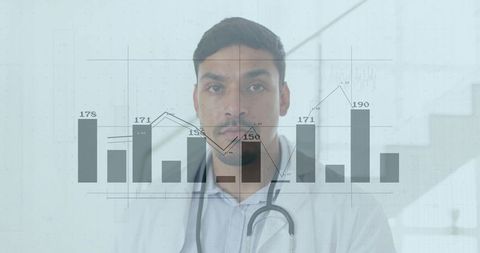 Asian Doctor Analyzing Chart Data in Hospital Corridor