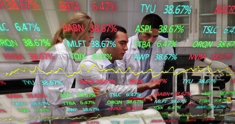 Researchers analyzing lab data with financial ticker overlay, teamwork in biotech lab