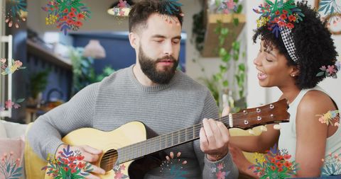 Diverse Couple Bonding Through Guitar Play Among Blossoms