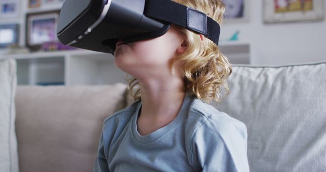 Young Boy Experiencing Virtual Reality Gaming at Home - Download Free Stock Images Pikwizard.com