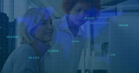Two Professional Women Analyzing Data with World Map Overlay in Office