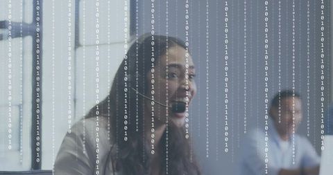 Customer support agent wearing headset smiling with binary data overlay in modern office