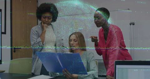 Diverse Businesswomen Collaborating on Data Visualization Insights