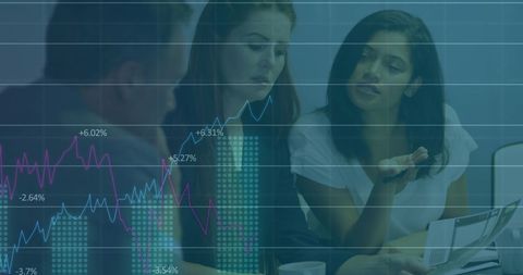 Team Analyzing Financial Growth Data in Office Setting