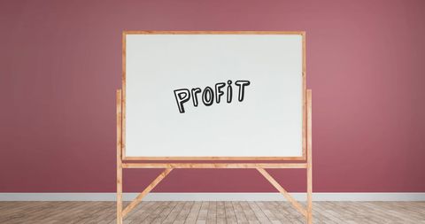 Profit concept on whiteboard in modern office