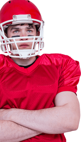 Confident football player in transparent kit posing cross-arms