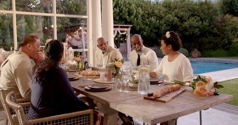 Elegant Outdoor Wedding Celebration with Diverse Seniors by Poolside