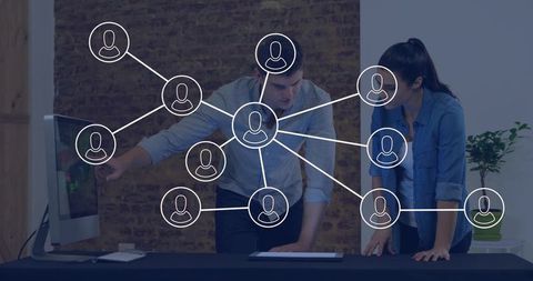 Office colleagues collaborating with network icons overlay