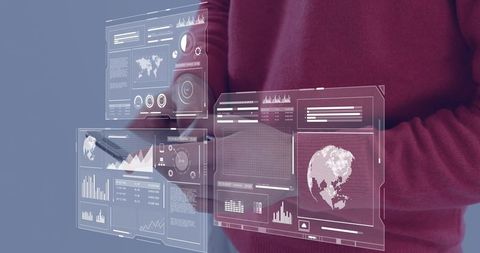 Business professional interacting with holographic analytics dashboards on tablet