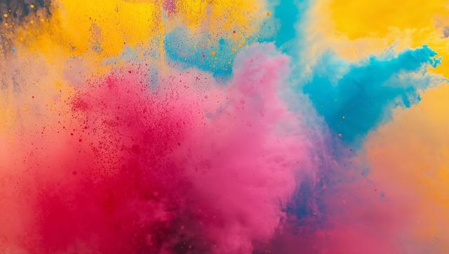 Colorful powder cloud explosion with magenta, blue, yellow, and orange