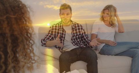 Couple therapy session with sunset overlay representing new beginnings