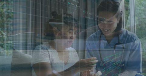 Caregivers providing medical support to senior patient at home