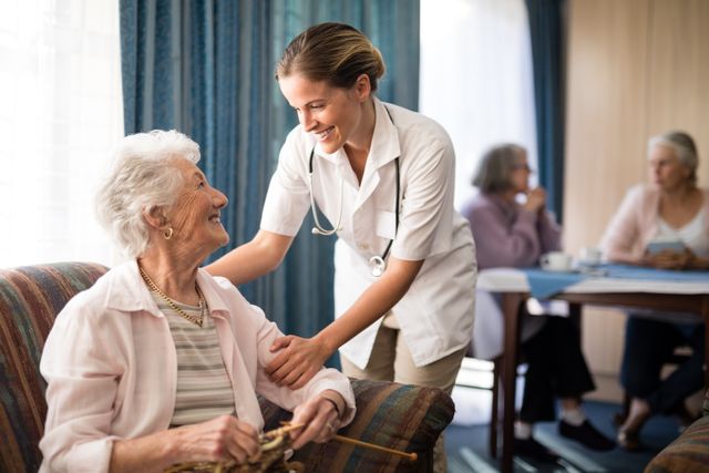 This image can be used for promoting healthcare services, senior living facilities, and caregiving support. It highlights the compassionate interaction between a healthcare professional and a senior resident, making it ideal for websites, brochures, and advertisements related to elderly care and medical assistance.