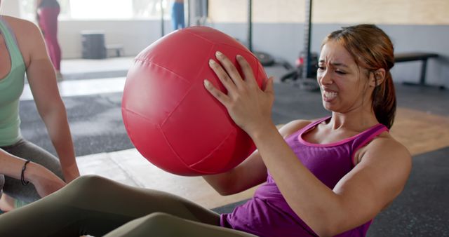 Woman Working Out with Medicine Ball in Gym - Download Free Stock Images Pikwizard.com