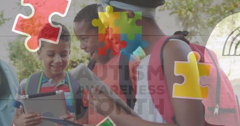 Diverse Children Engaging with Tablets Celebrating Autism Awareness