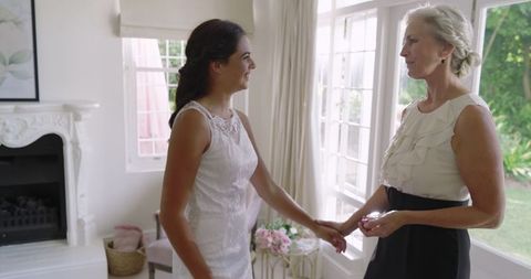 Bride and Mother Sharing Emotional Moment Before Wedding Ceremony
