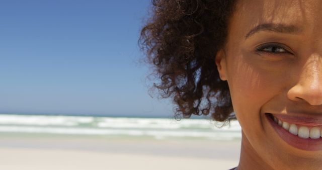 Close-up of Smiling Woman on Sunny Beach - Download Free Stock Images Pikwizard.com