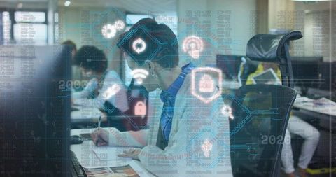 Writing employee documenting notes with cybersecurity ui overlay in open office workspace