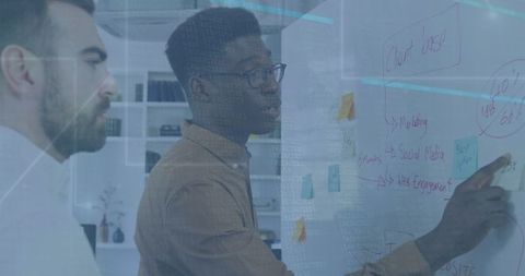 Team Brainstorming with Data Overlay in Modern Office