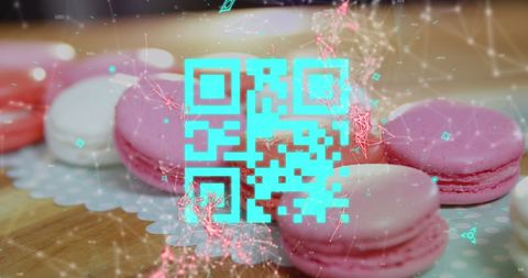 Colorful QR Code Overlay on Delicious Pink Macarons