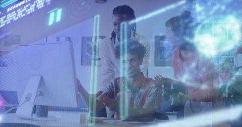 Diverse Team Collaborating on Digital Innovation Project at Office Desk