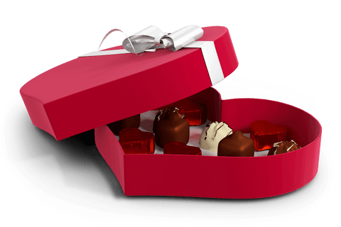 heart shaped transparent box with mixed chocolates and ribbon bow - Download Free Stock Videos Pikwizard.com