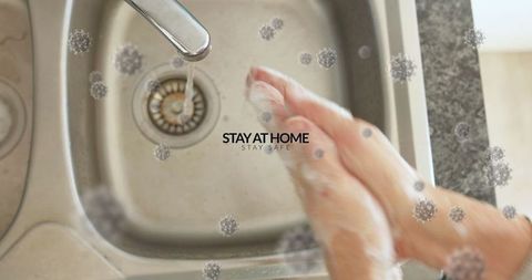 Promoting hygiene through handwashing in kitchen with stay safe message