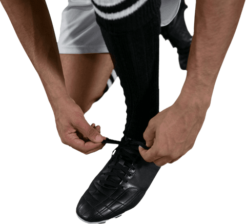 Football Player Tying Shoe Laces on Transparent Background