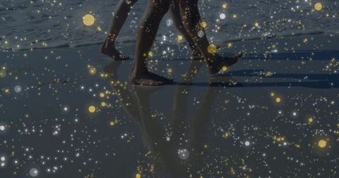 Romantic Beach Walk with Magical Sparkles and Reflections