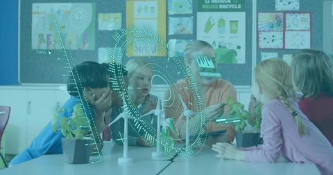 Teacher guiding students exploring wind energy with AR holograms in classroom