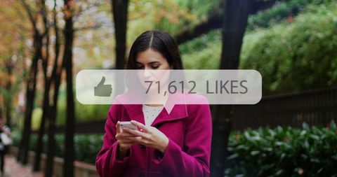 Social Media Engagement with Smartphone User in Autumn Park