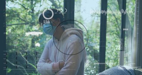 Chinese teenage girl wearing surgical mask and eyeglasses by window with HUD overlay