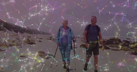 Active Senior Couple Hiking through Digital Connected World