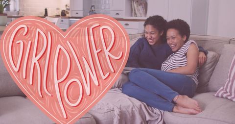 Happy Couple Embracing Girl Power on Cozy Sofa