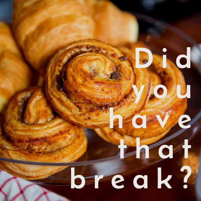 This image showcases a selection of freshly baked pastries, including croissants and swirls, placed in a glass bowl. The text 'Did you have that break?' is creatively imposed over the pastries, making it perfect for promoting bakery shops, breakfast specials, café advertisements, or motivational content for taking breaks.