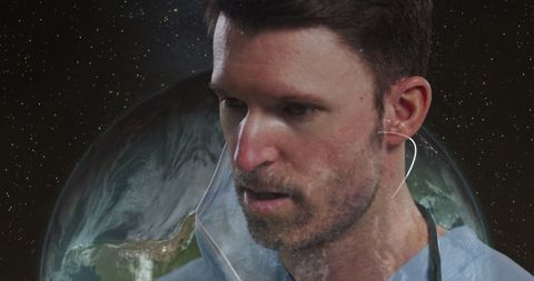 Doctor removes mask against global background: pandemic reflections