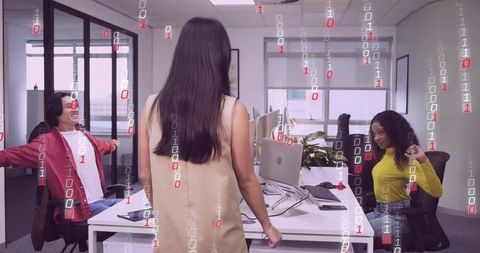 Professionals Collaborating in Modern Office with Binary Overlay