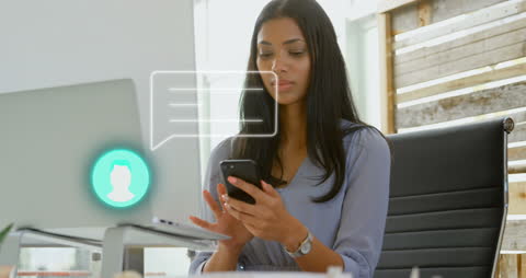 Businesswoman Engaging with Digital Media Using Smartphone at Workspace